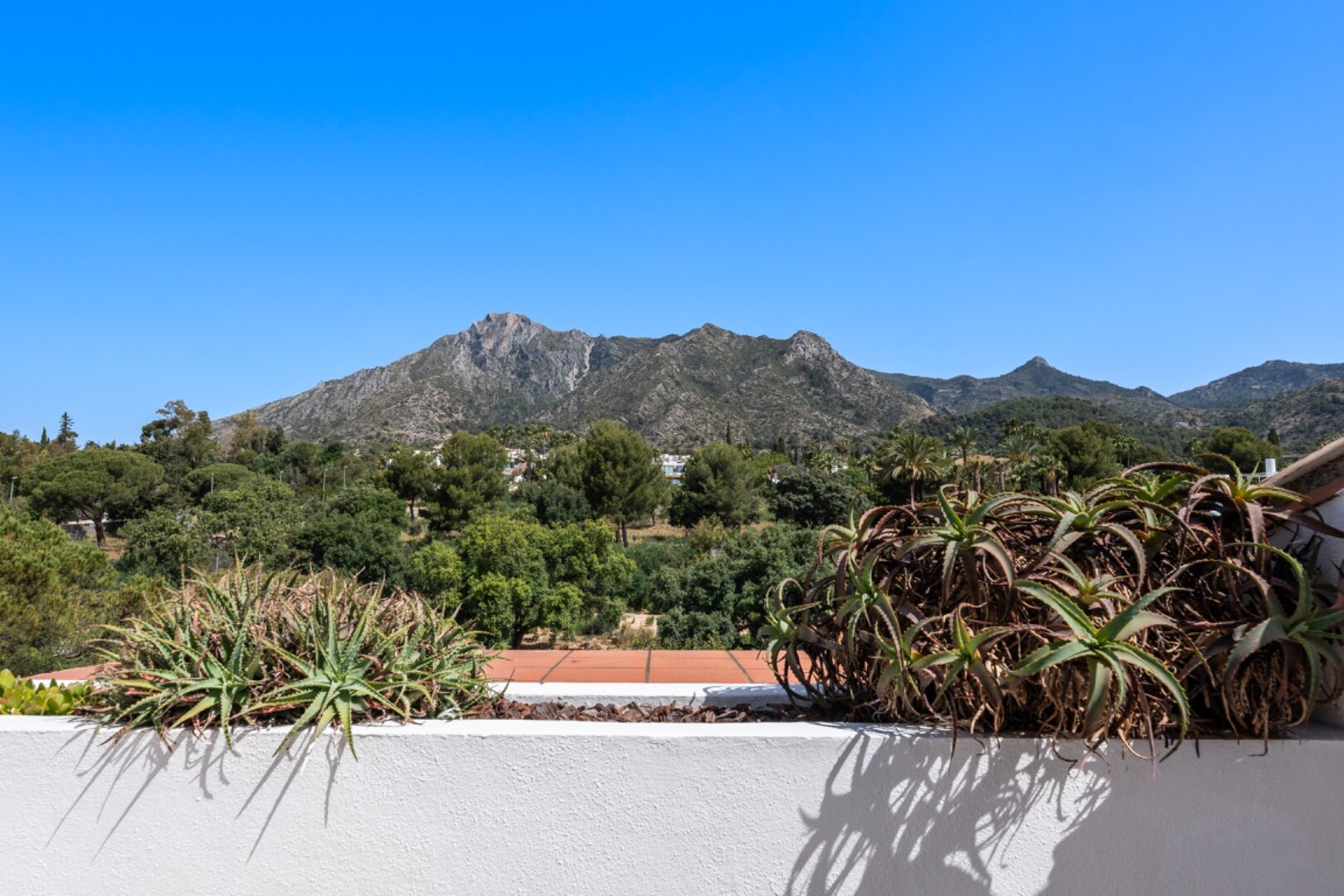 Incredible 4 bedroom duplex penthouse within prestigious gated community offers stunning views