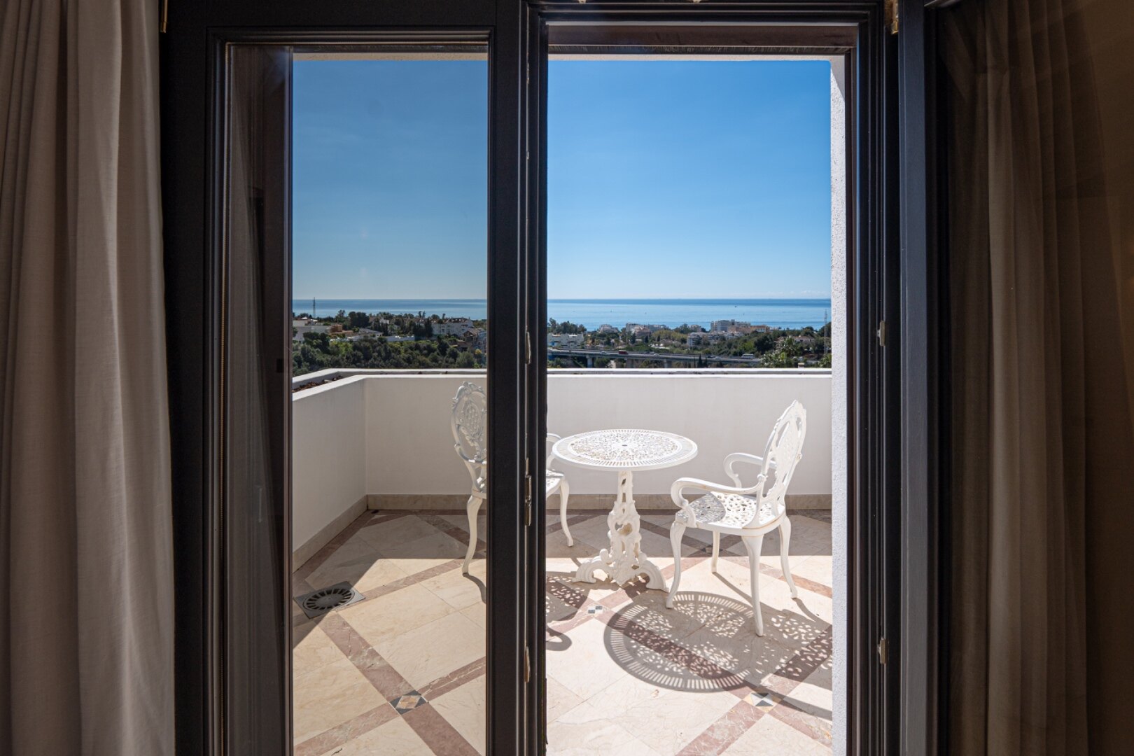 Incredible 4 bedroom duplex penthouse within prestigious gated community offers stunning views