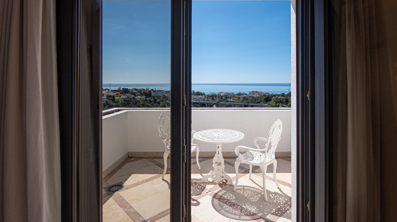 Incredible 4 bedroom duplex penthouse within prestigious gated community offers stunning views