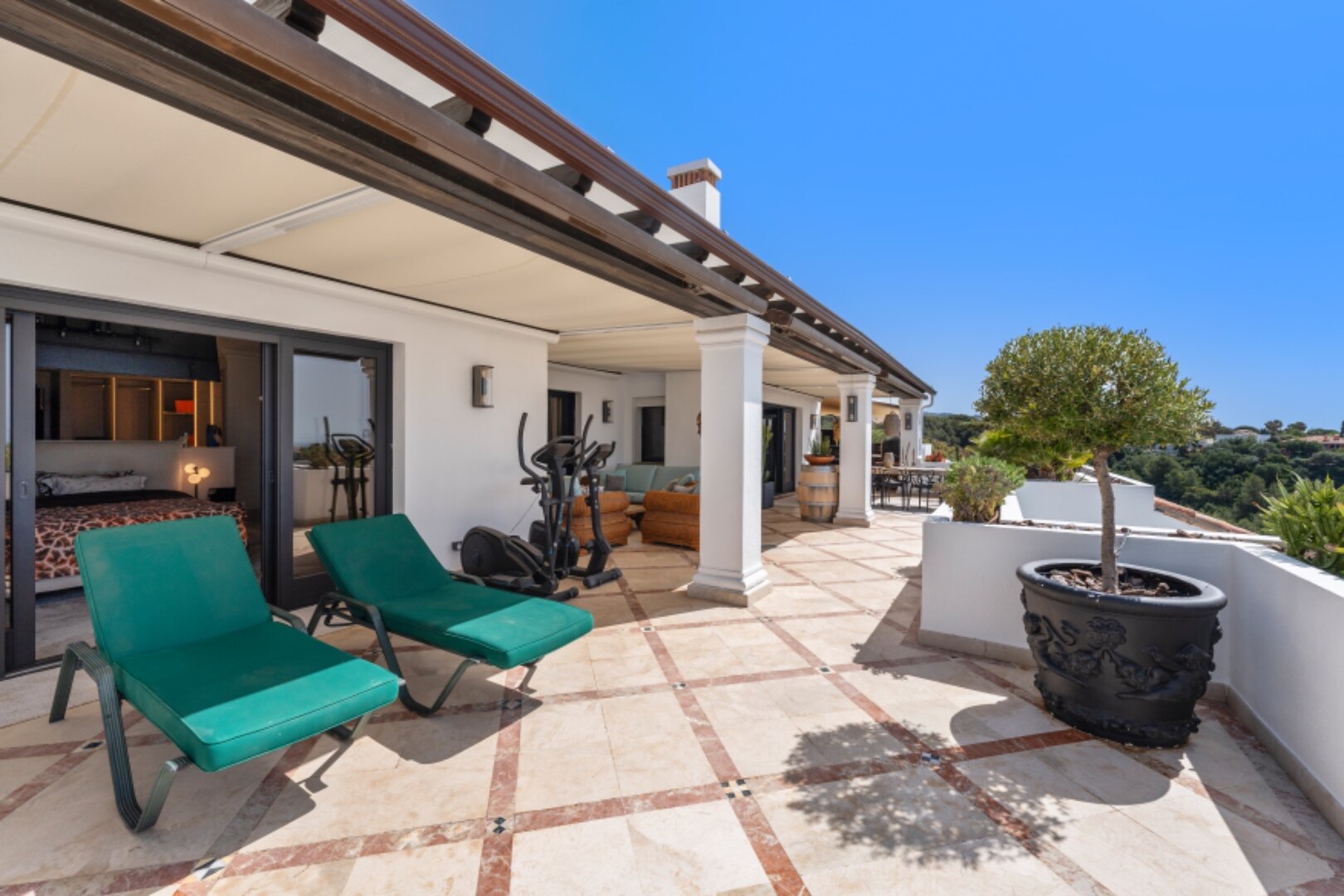 Incredible 4 bedroom duplex penthouse within prestigious gated community offers stunning views