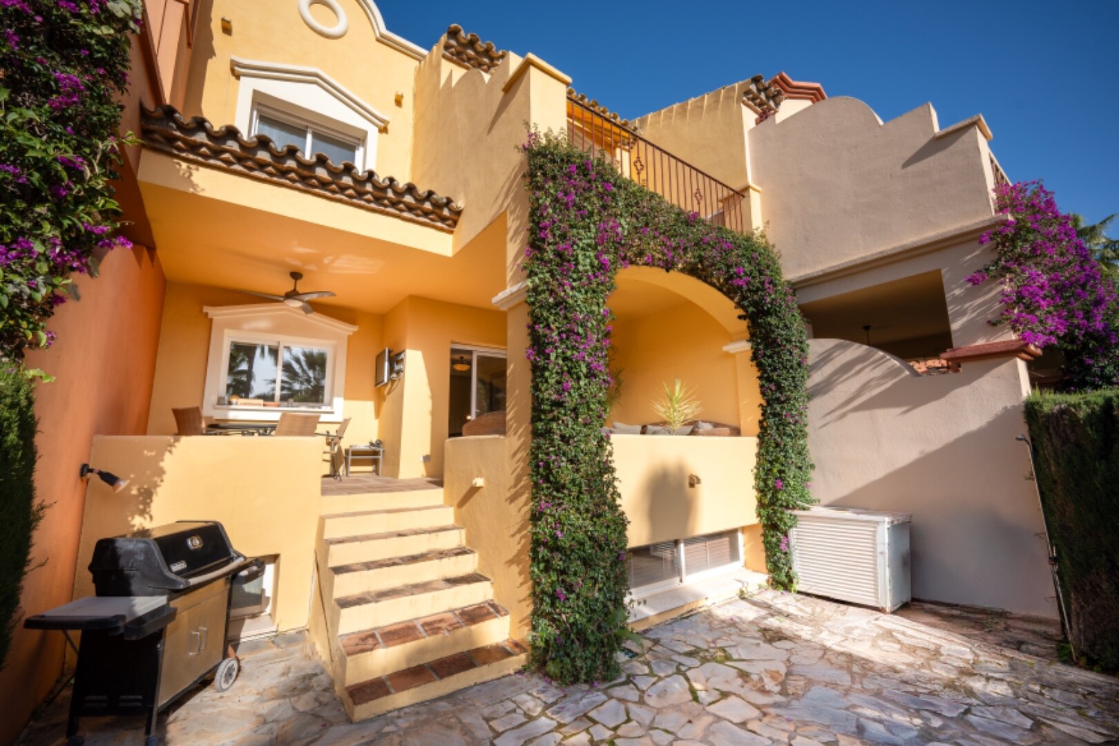 Stately 4 bedroom townhouse in quiet leafy streets in a renowned gated community is chic & welcoming