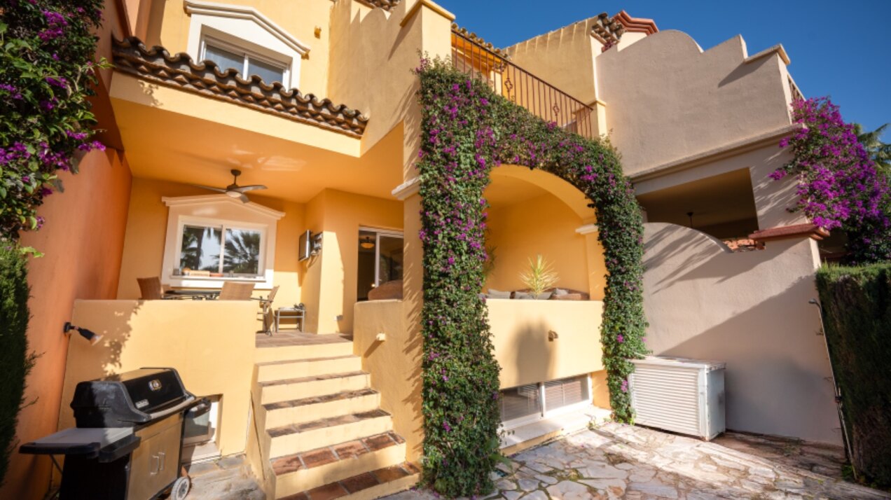 Stately 4 bedroom townhouse in quiet leafy streets in a renowned gated community is chic & welcoming