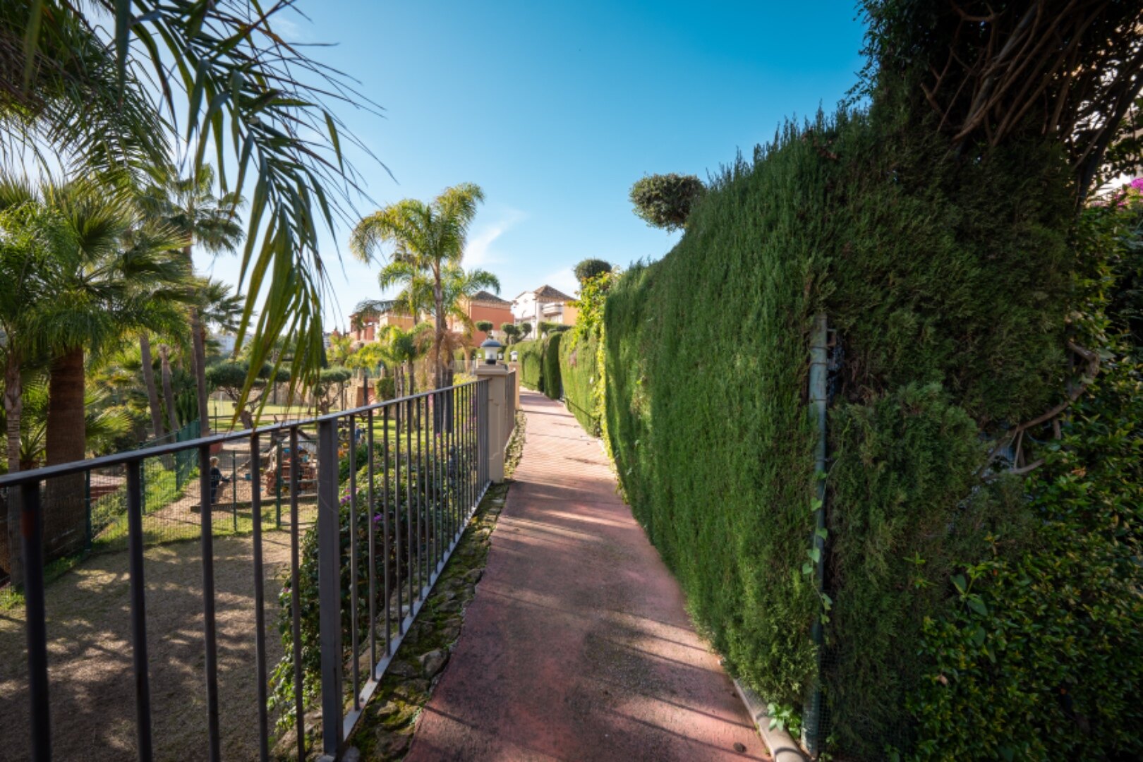 Stately 4 bedroom townhouse in quiet leafy streets in a renowned gated community is chic & welcoming