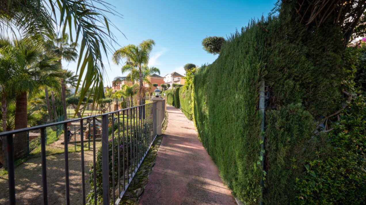 Stately 4 bedroom townhouse in quiet leafy streets in a renowned gated community is chic & welcoming
