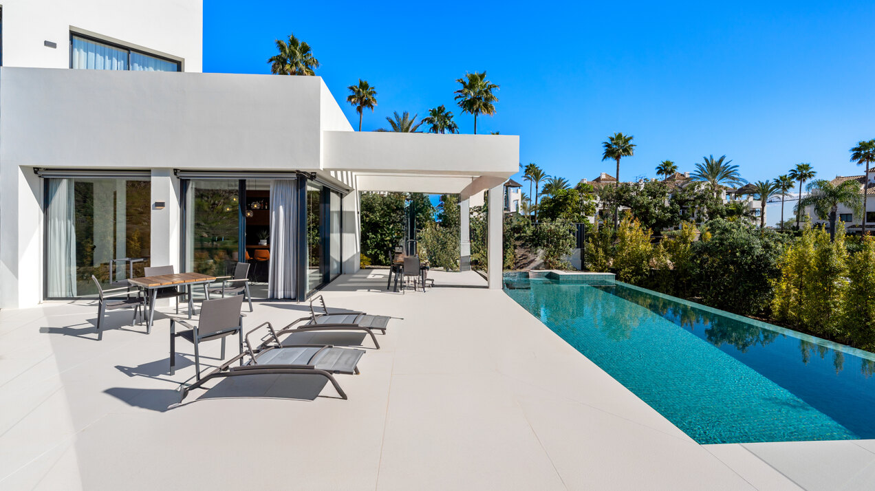 Elegant, chic and impressive - this 4 bedroom villa within a gated community embodies modernity