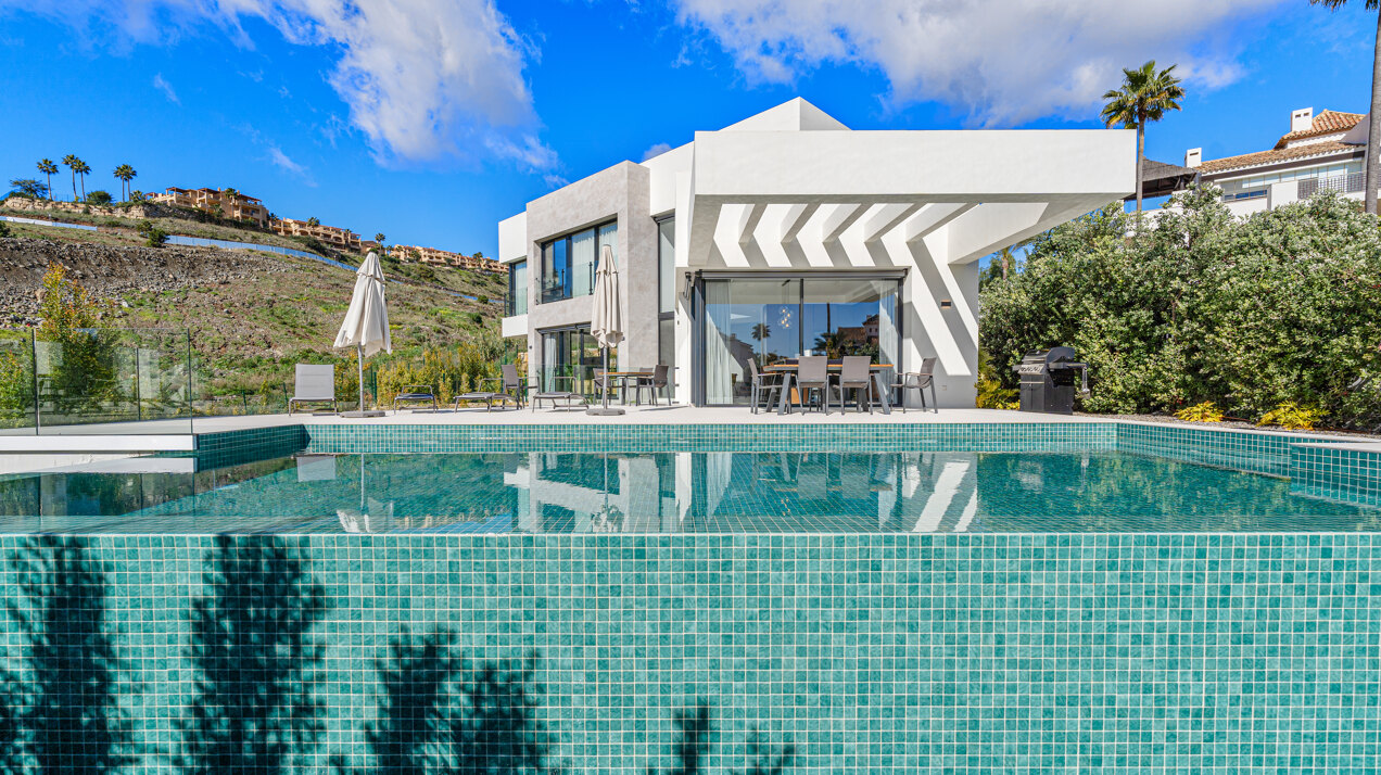 Elegant, chic and impressive - this 4 bedroom villa within a gated community embodies modernity