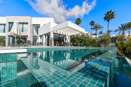 Elegant, chic and impressive - this 4 bedroom villa within a gated community embodies modernity