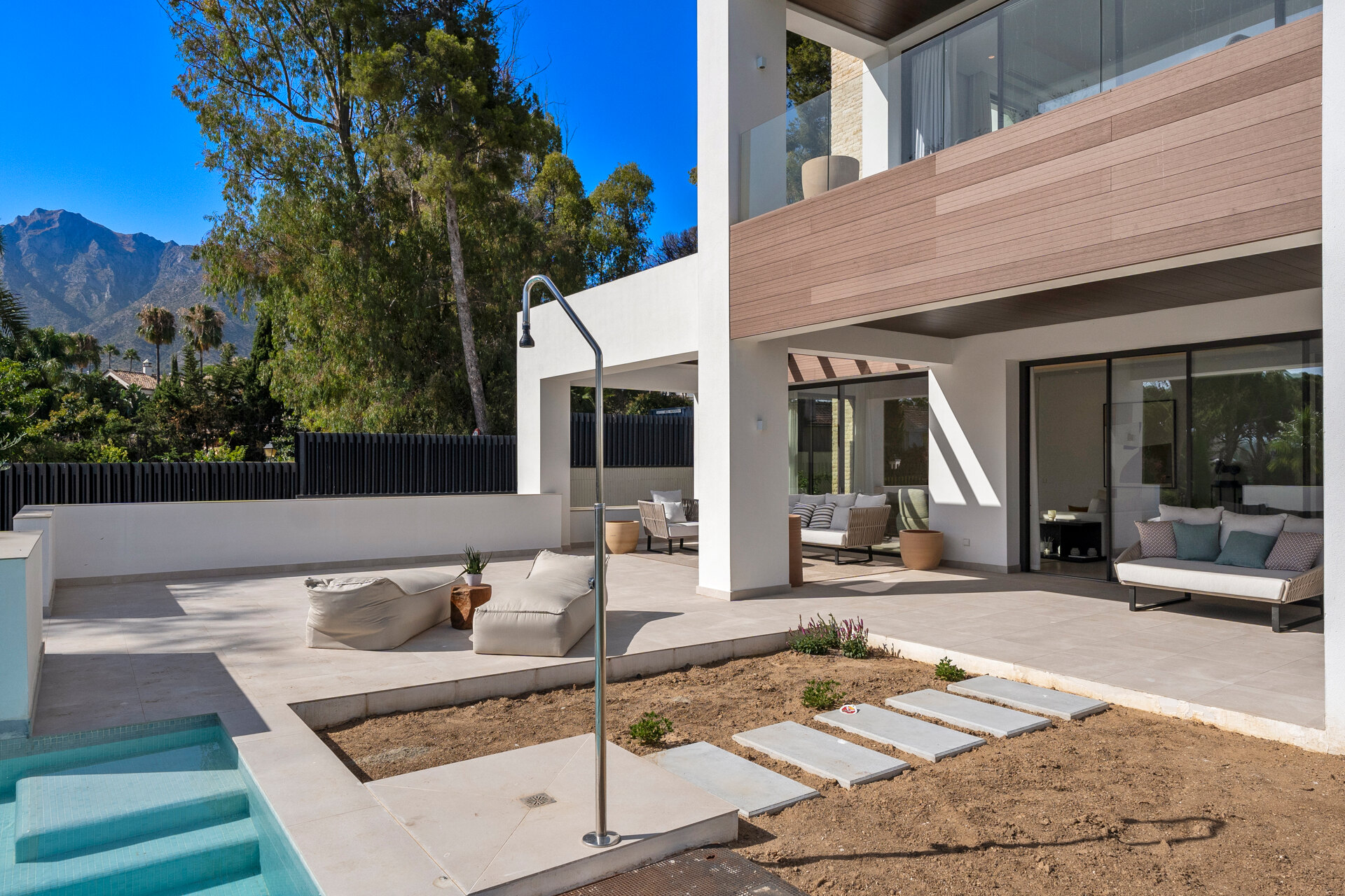 Understated elegant 4 bed villa nestled in luxury community on Marbellas Golden Mile
