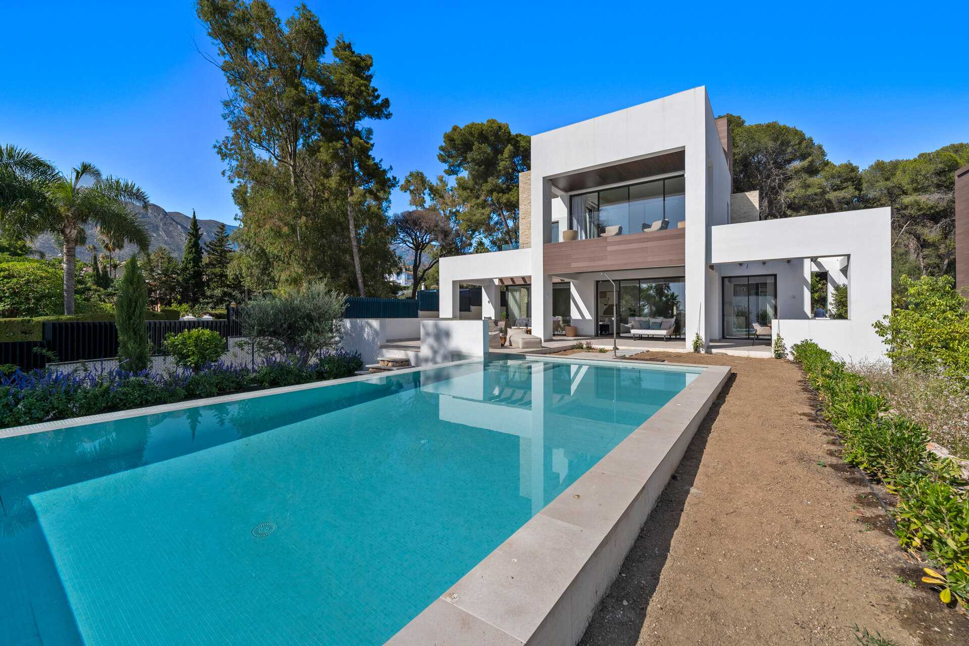 Understated elegant 4 bed villa nestled in luxury community on Marbellas Golden Mile