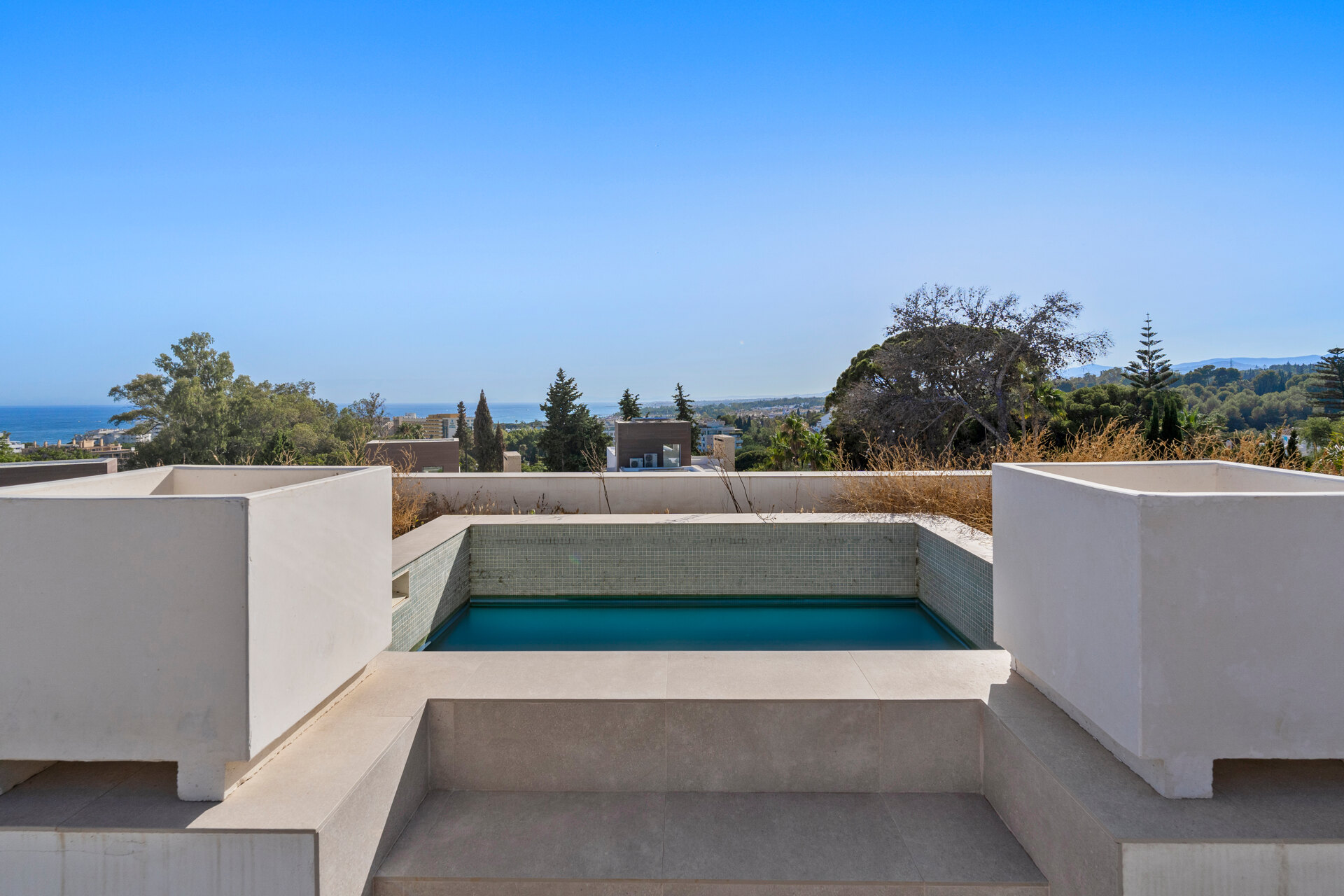 Understated elegant 4 bed villa nestled in luxury community on Marbellas Golden Mile