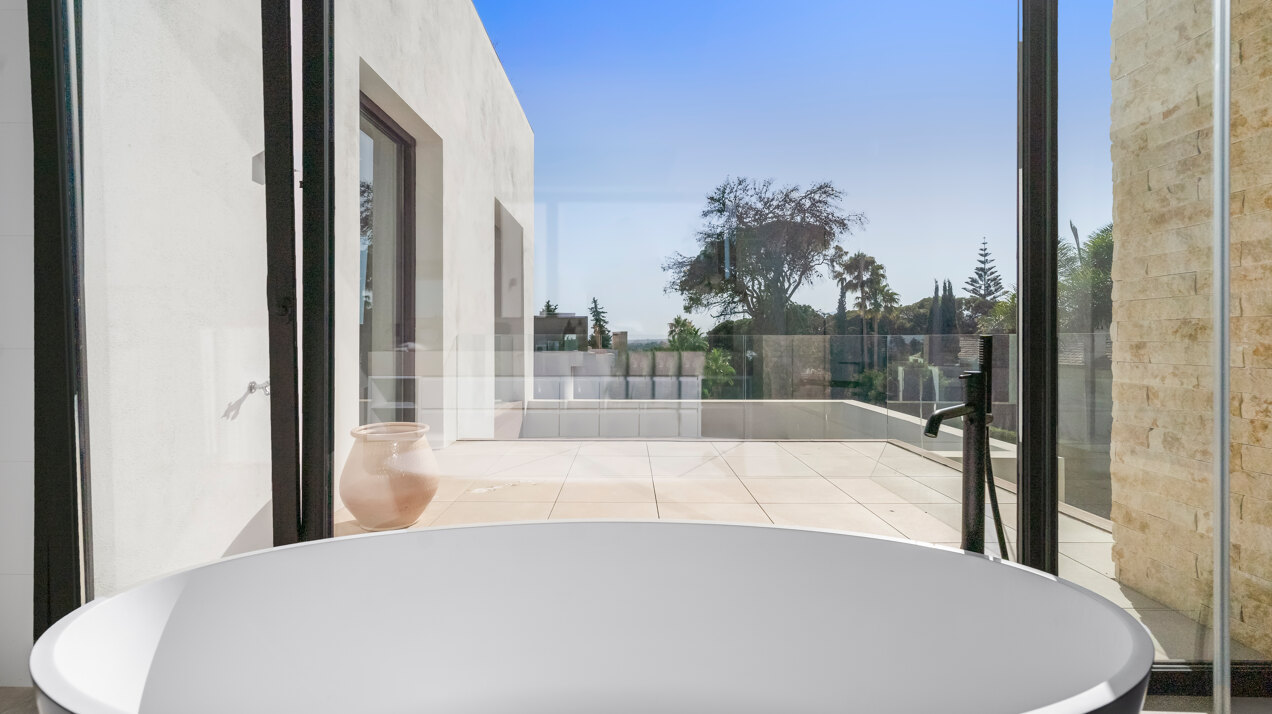 Understated elegant 4 bed villa nestled in luxury community on Marbellas Golden Mile