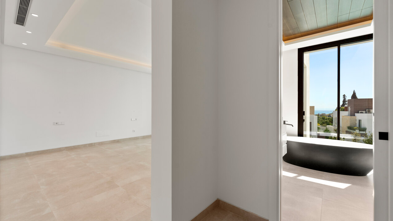Sleek, chic and modern 4 bedroom villa nestled within prestigious community on Marbella Golden Mile