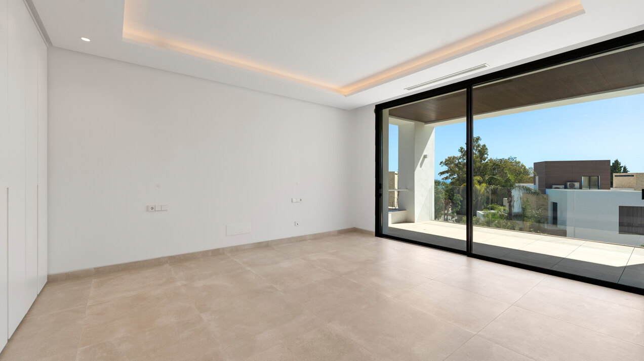 Sleek, chic and modern 4 bedroom villa nestled within prestigious community on Marbella Golden Mile