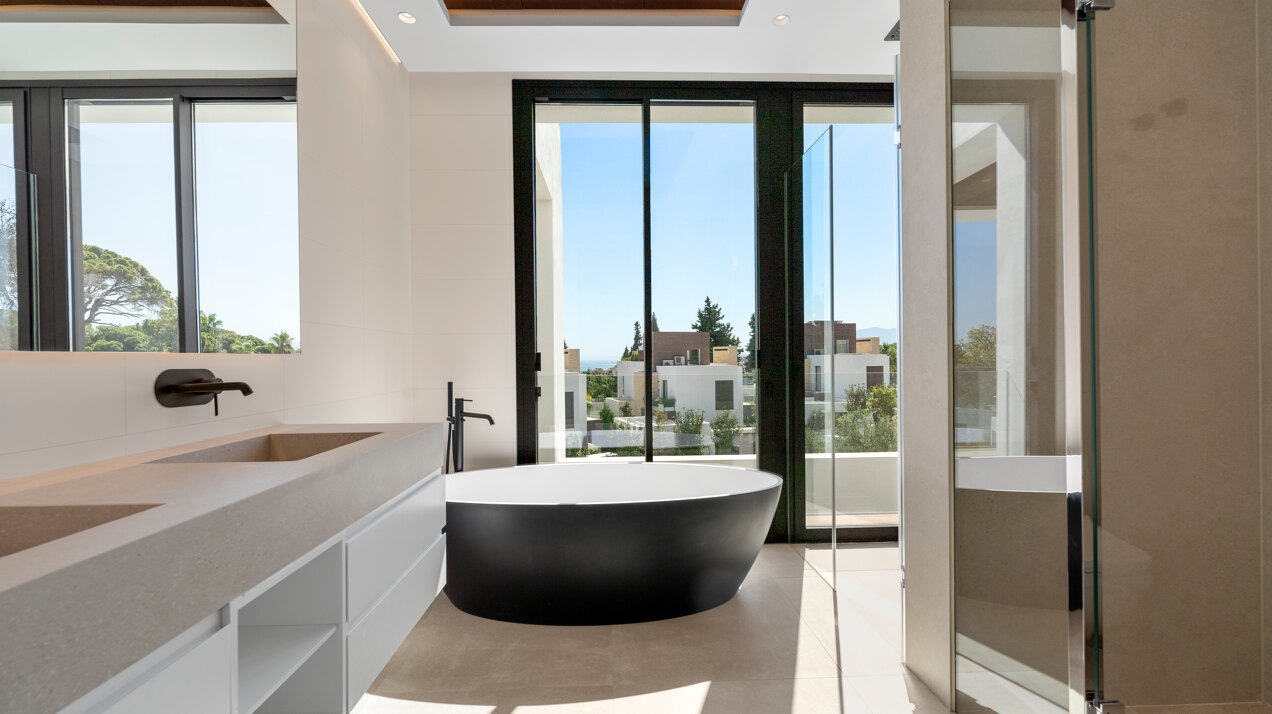 Sleek, chic and modern 4 bedroom villa nestled within prestigious community on Marbella Golden Mile