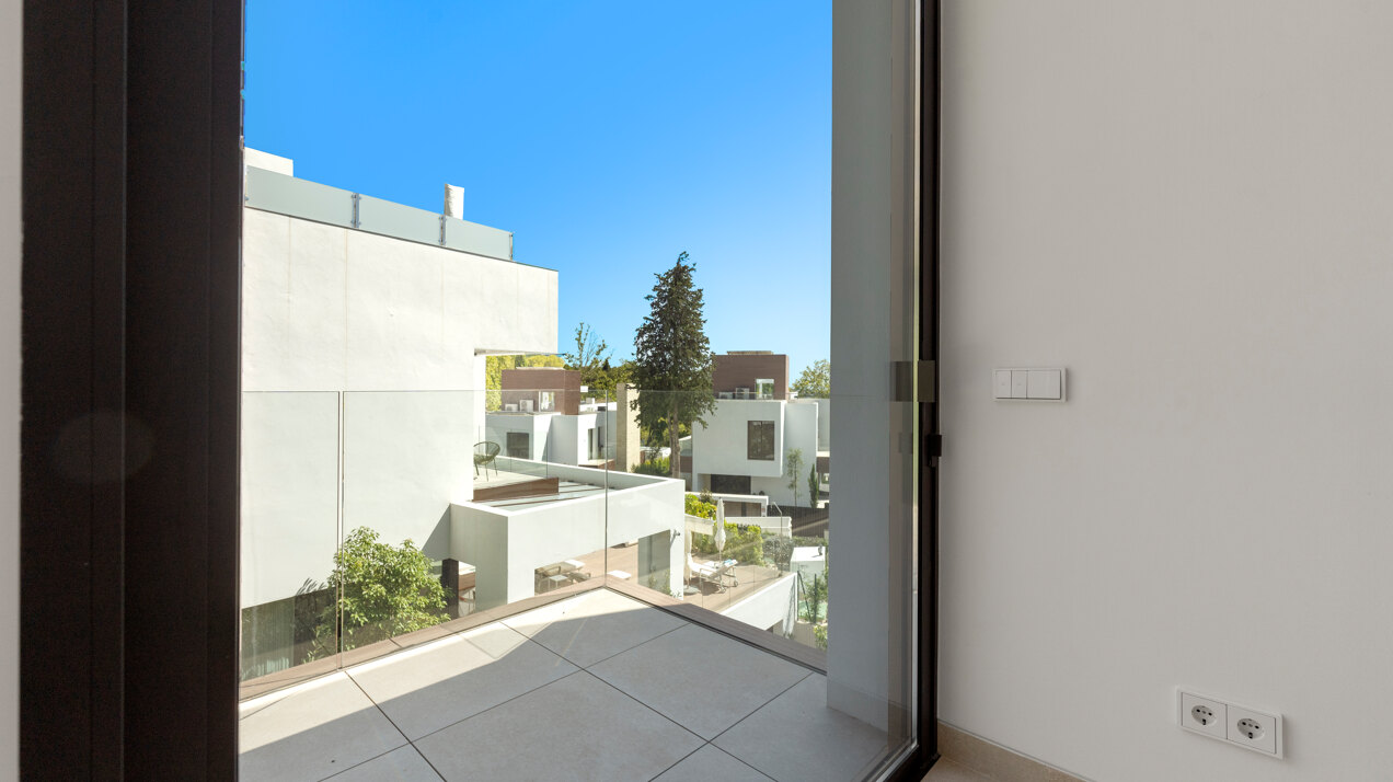 Sleek, chic and modern 4 bedroom villa nestled within prestigious community on Marbella Golden Mile