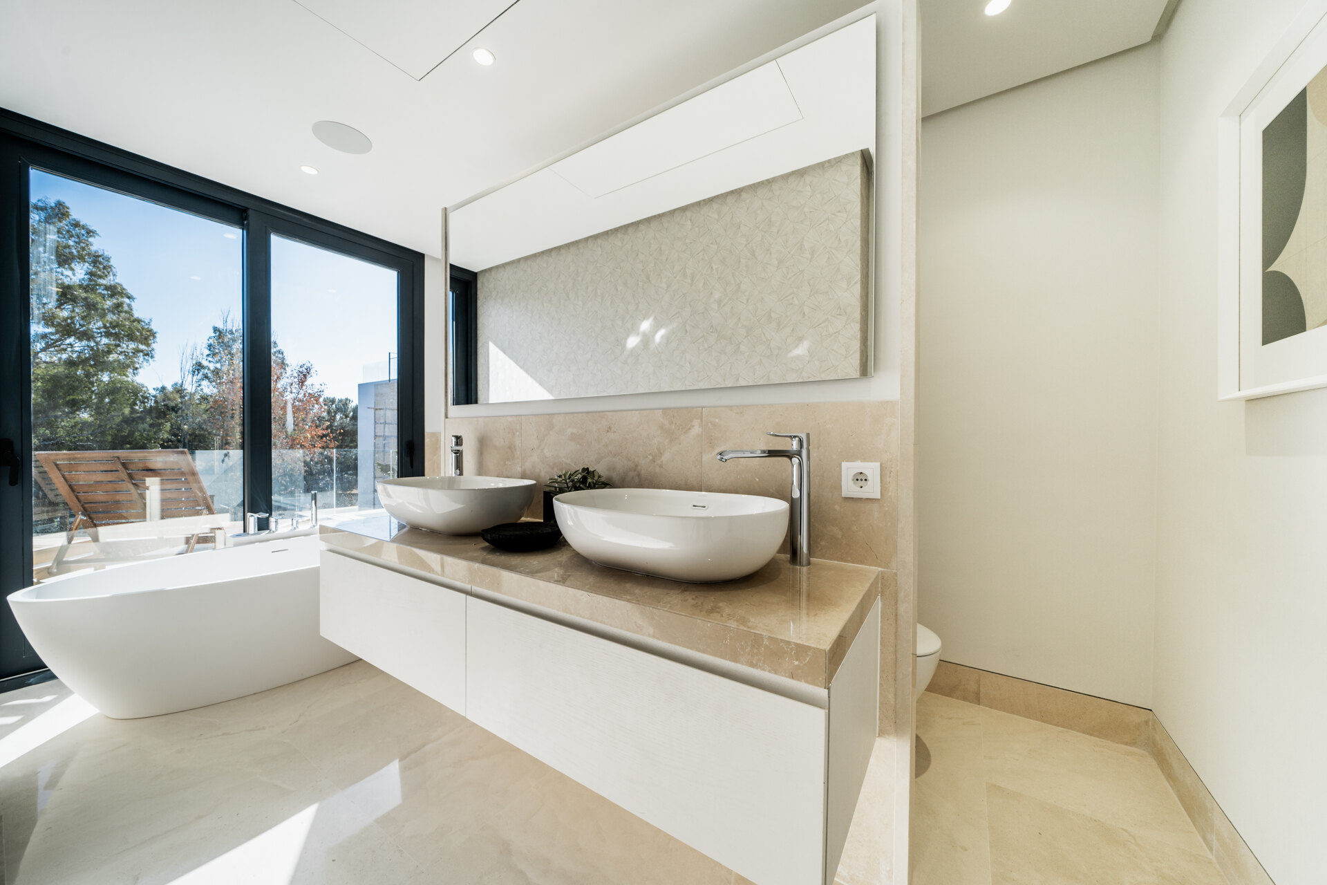 Exquisite contemporary villa nestled in the picturesque landscapes between Marbella and Estepona.