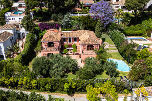 Property Highlights:- Prime Golf Valley Location- Andalusian-Style Architecture- Five Spacious Bedrooms- Four Luxury Bathrooms- Private Pool & Sun Terraces- Mountain & Golf Course Views- Traditional Courtyard Fountain- Mature Mediterranean Gardens- Bright Open-Plan Living Areas- Minutes to Marbella Beaches