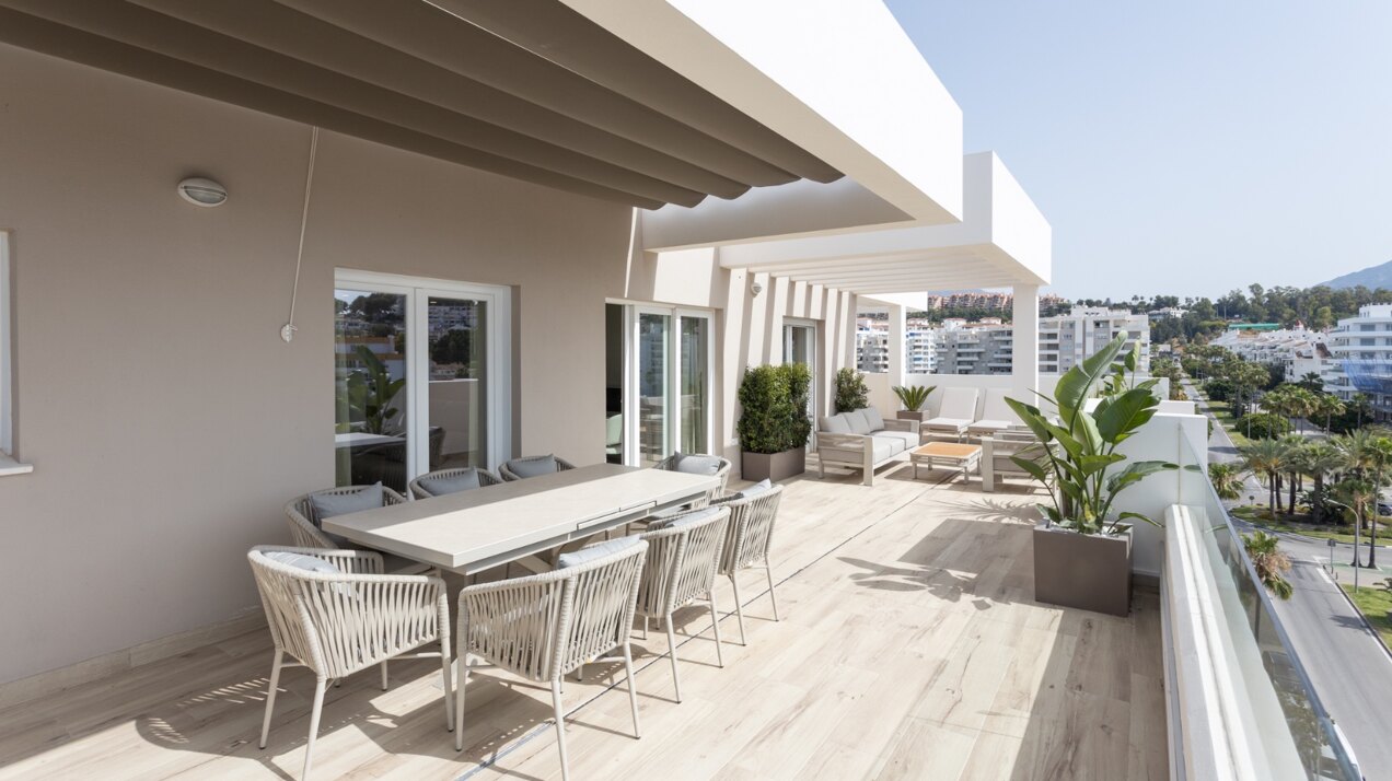 Refined coastal living at its finest in this penthouse