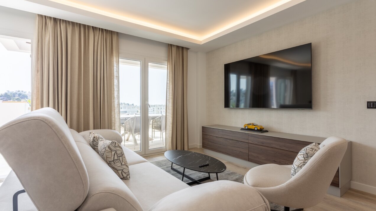 Refined coastal living at its finest in this penthouse