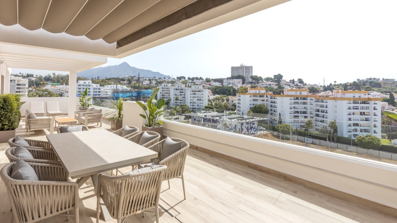 Refined coastal living at its finest in this penthouse