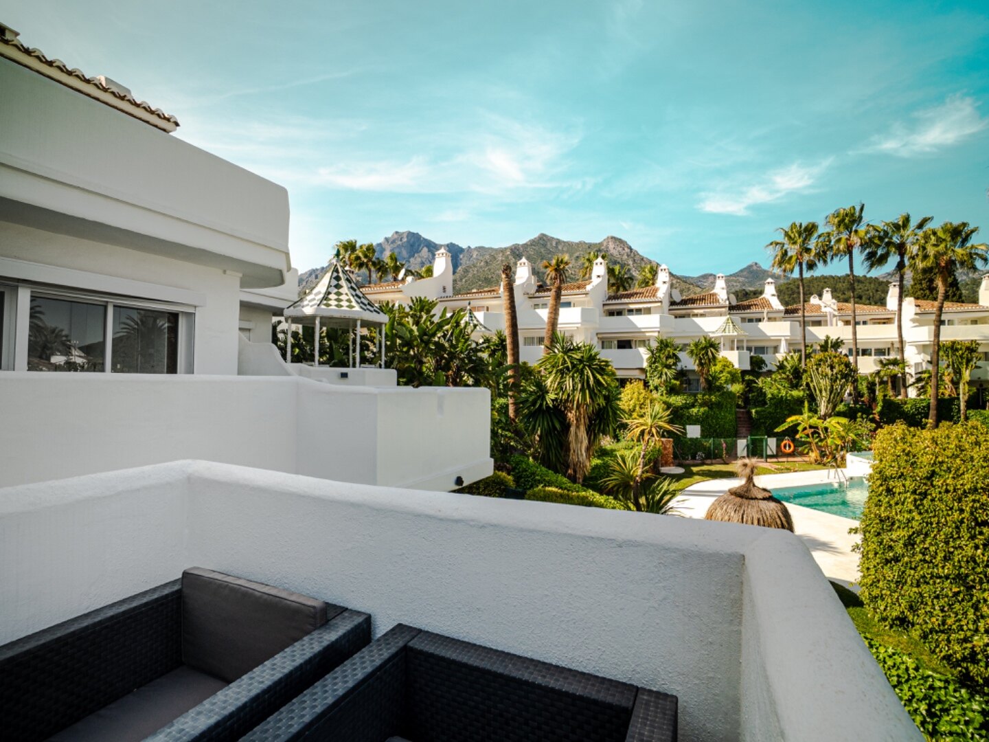 Light, tranquil and welcoming - this townhouse sits elegantly within its leafy Marbella enclave