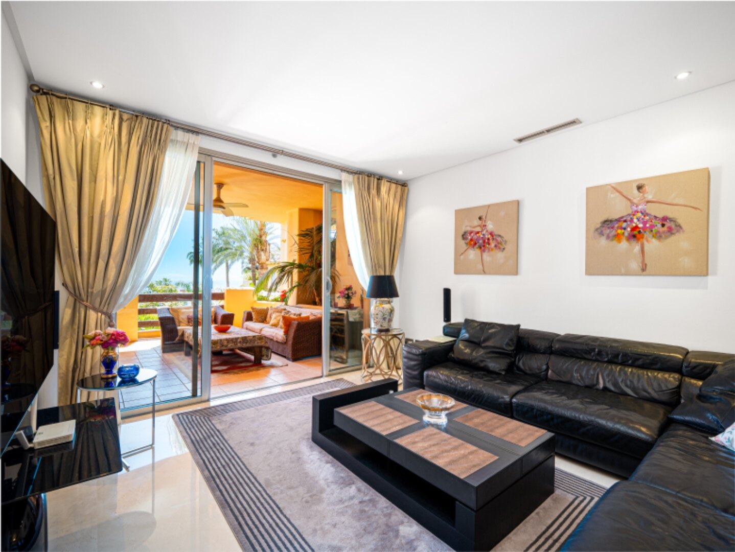 Gloriously sunny & spacious, this 3 bed apartment on the Golden Mile will dazzle and delight