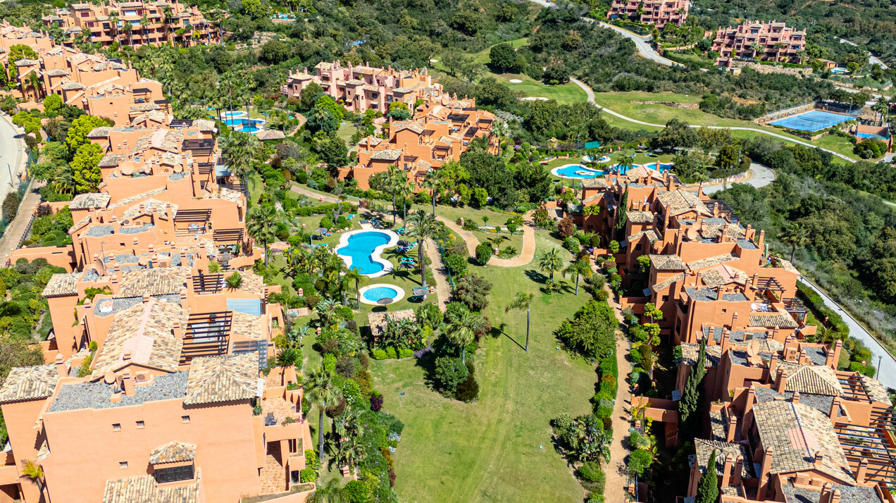 Dazzling 3 bedroom duplex penthouse with panoramic views sits within prestigious golf complex