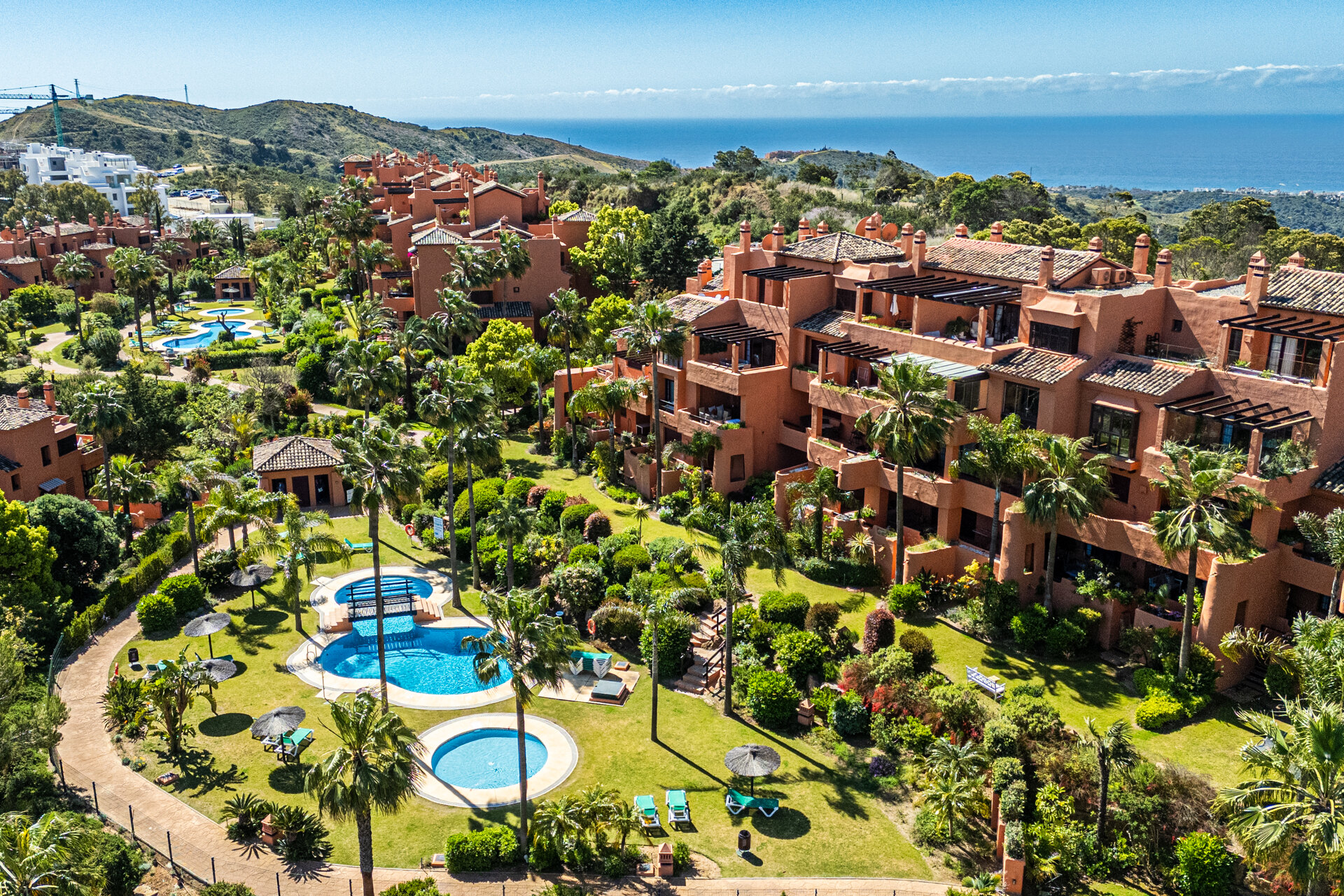 Dazzling 3 bedroom duplex penthouse with panoramic views sits within prestigious golf complex