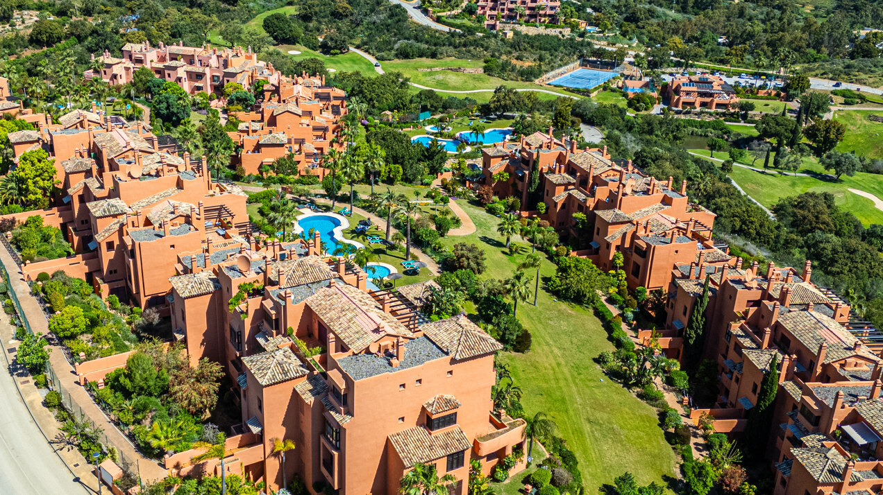 Dazzling 3 bedroom duplex penthouse with panoramic views sits within prestigious golf complex