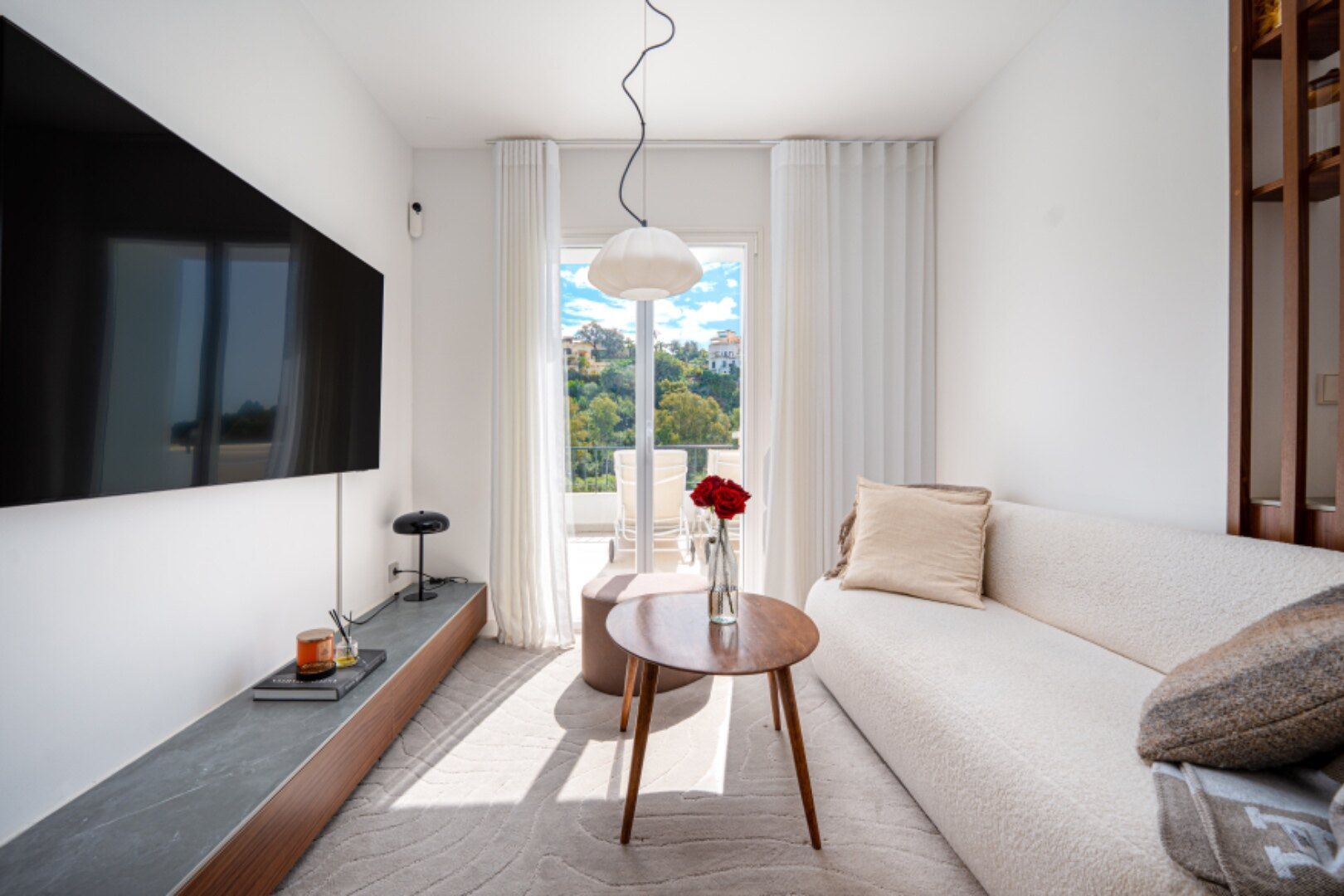 Stunning modern and luxurious apartment overlooks golf course and green valleys in Benahavis