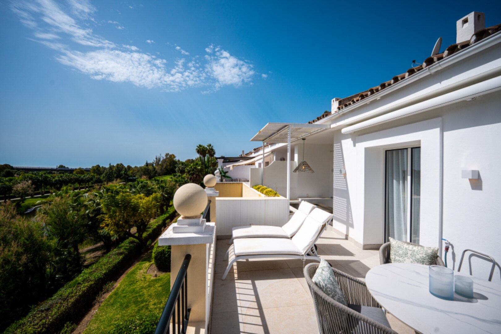 Stunning modern and luxurious apartment overlooks golf course and green valleys in Benahavis