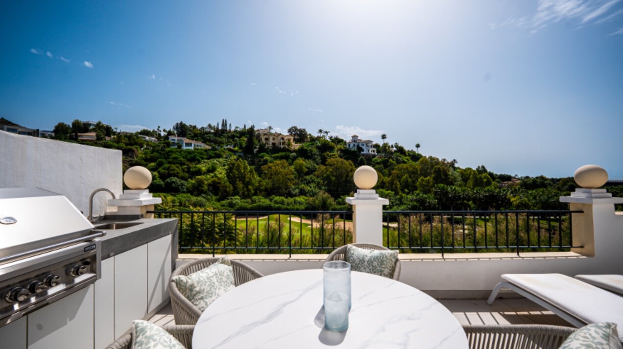 Stunning modern and luxurious apartment overlooks golf course and green valleys in Benahavis