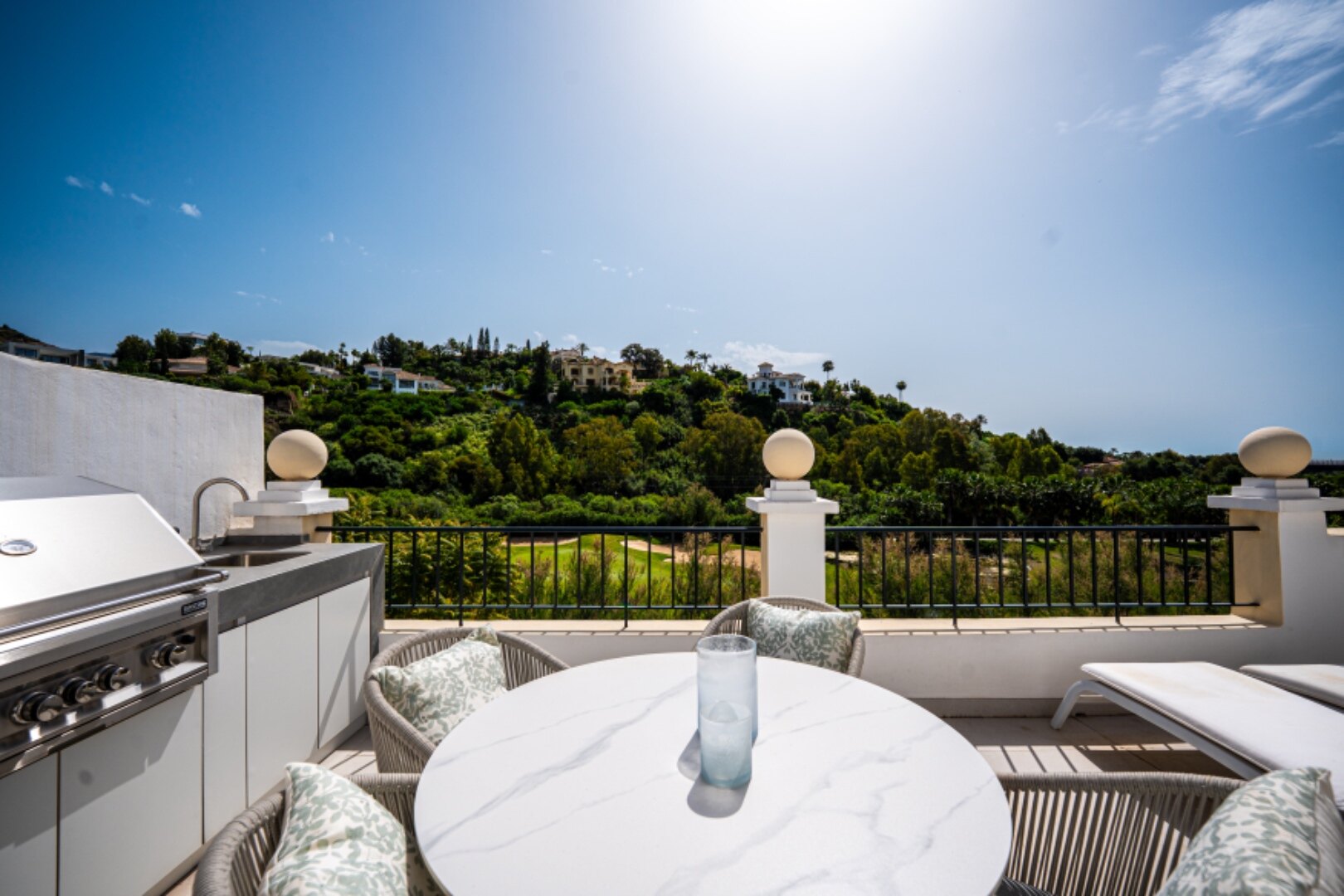 Stunning modern and luxurious apartment overlooks golf course and green valleys in Benahavis