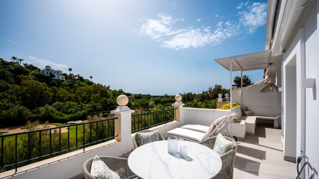 Stunning modern and luxurious apartment overlooks golf course and green valleys in Benahavis