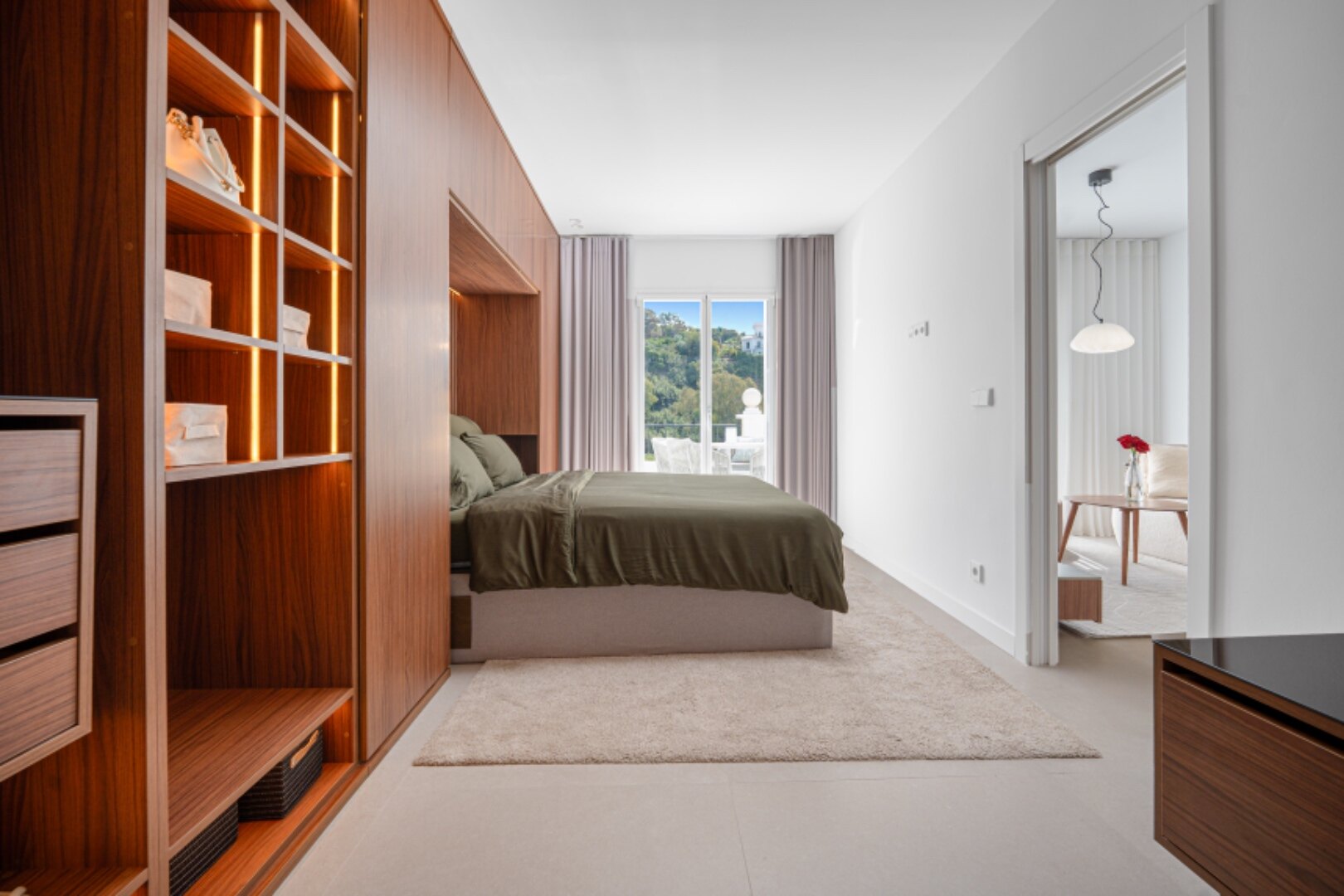 Stunning modern and luxurious apartment overlooks golf course and green valleys in Benahavis