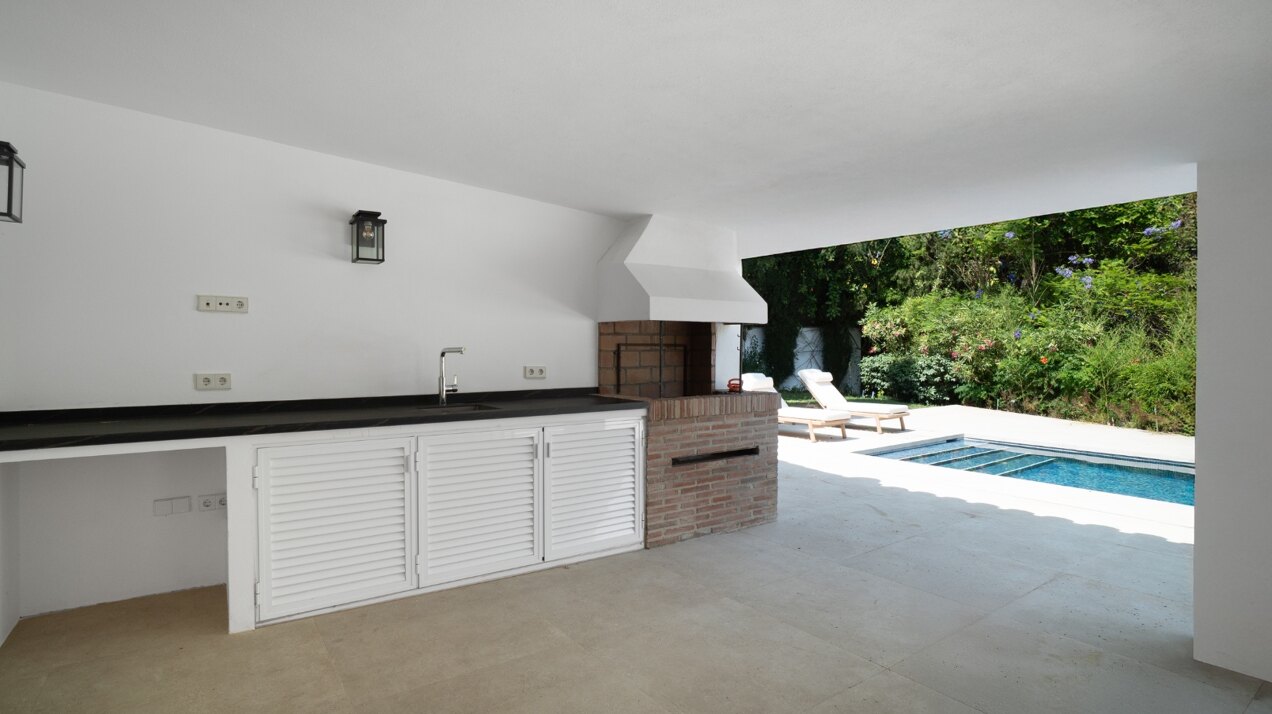 This exquisite, turnkey villa is a hidden gem that seamlessly blends modernity with ultimate comfort