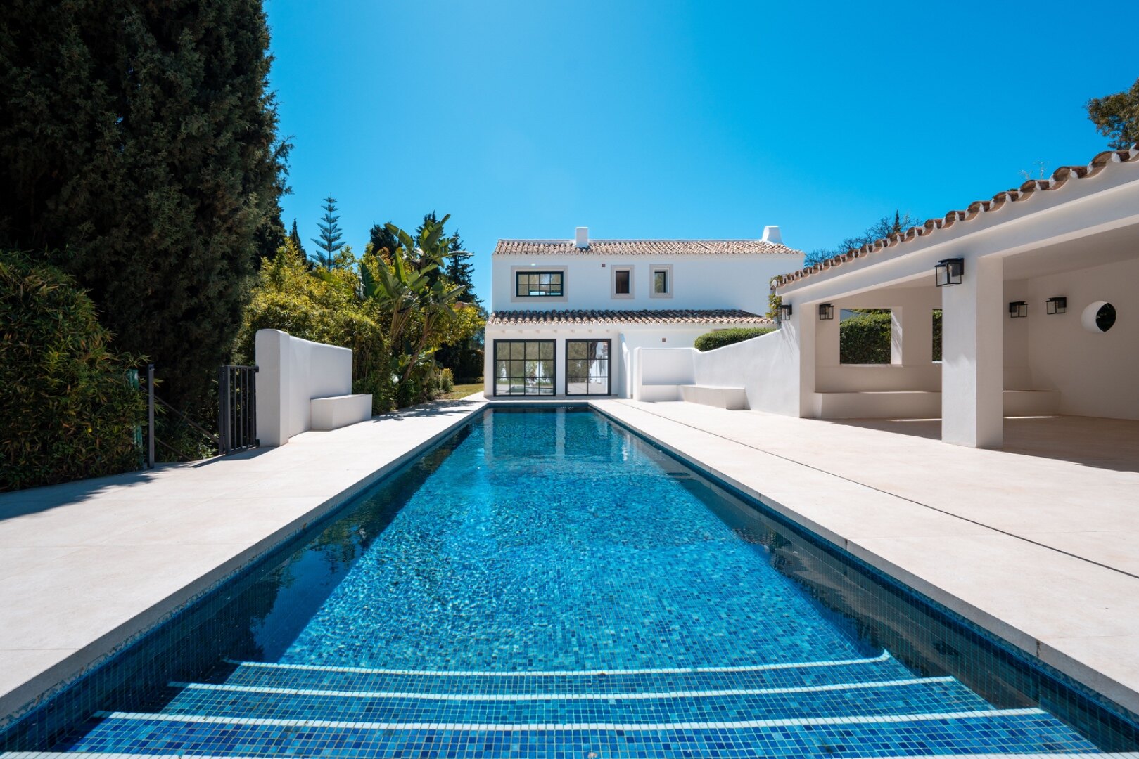 This exquisite, turnkey villa is a hidden gem that seamlessly blends modernity with ultimate comfort