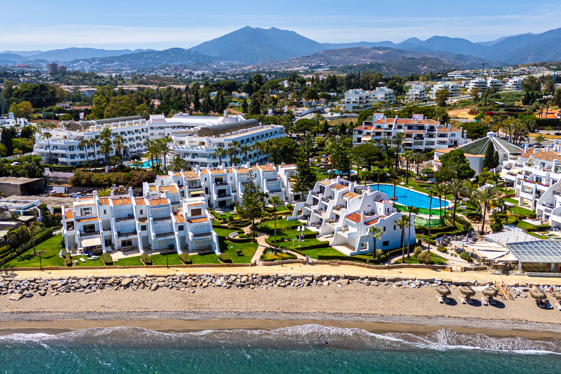 Exceptional beachfront townhouse offers the ultimate coastal lifestyle with uninterrupted sea views