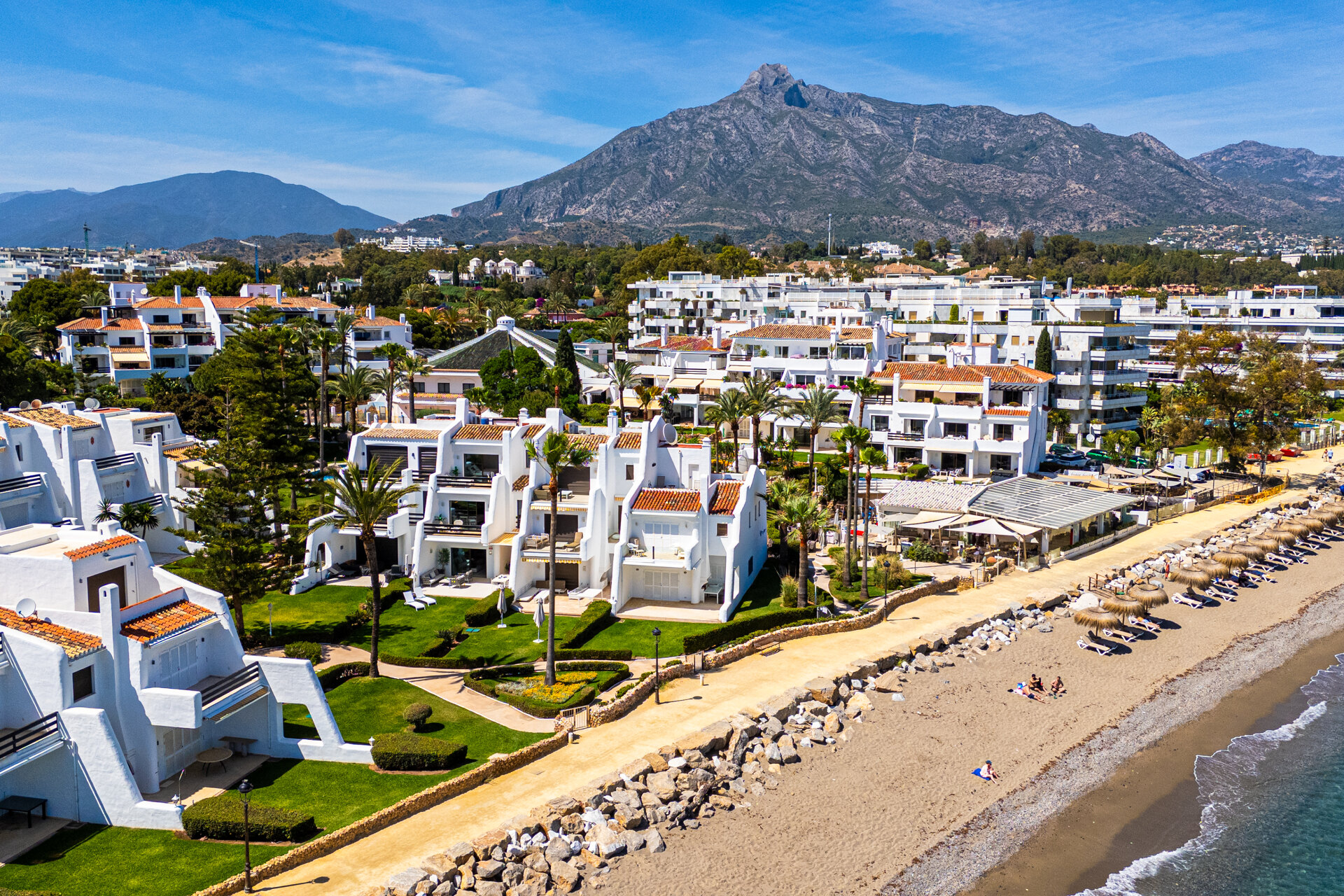 Exceptional beachfront townhouse offers the ultimate coastal lifestyle with uninterrupted sea views