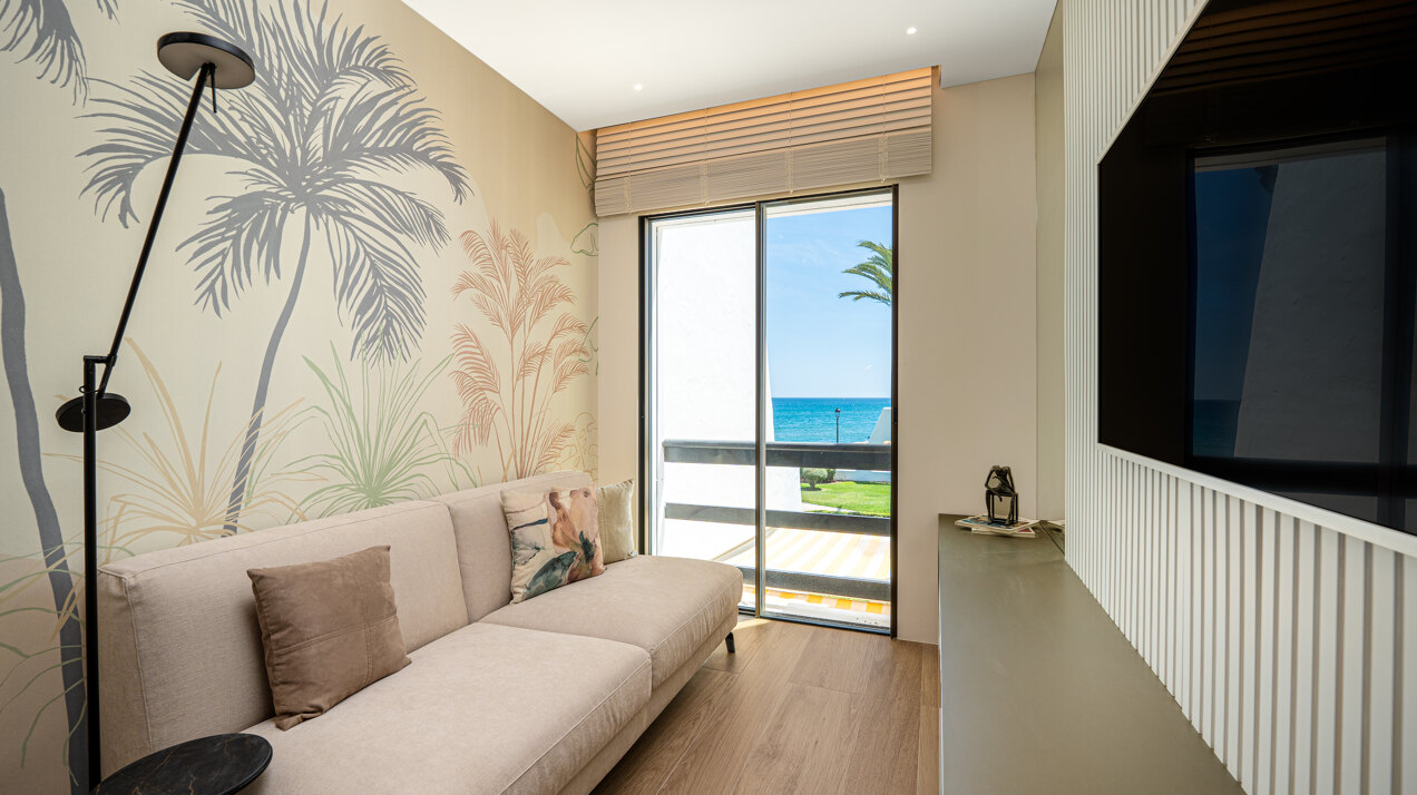 Exceptional beachfront townhouse offers the ultimate coastal lifestyle with uninterrupted sea views