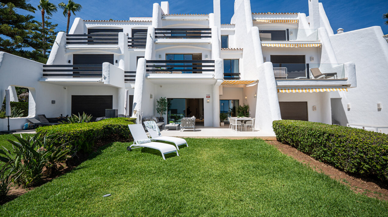 Exceptional beachfront townhouse offers the ultimate coastal lifestyle with uninterrupted sea views