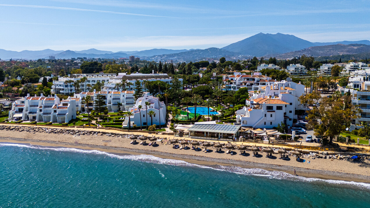 Exceptional beachfront townhouse offers the ultimate coastal lifestyle with uninterrupted sea views