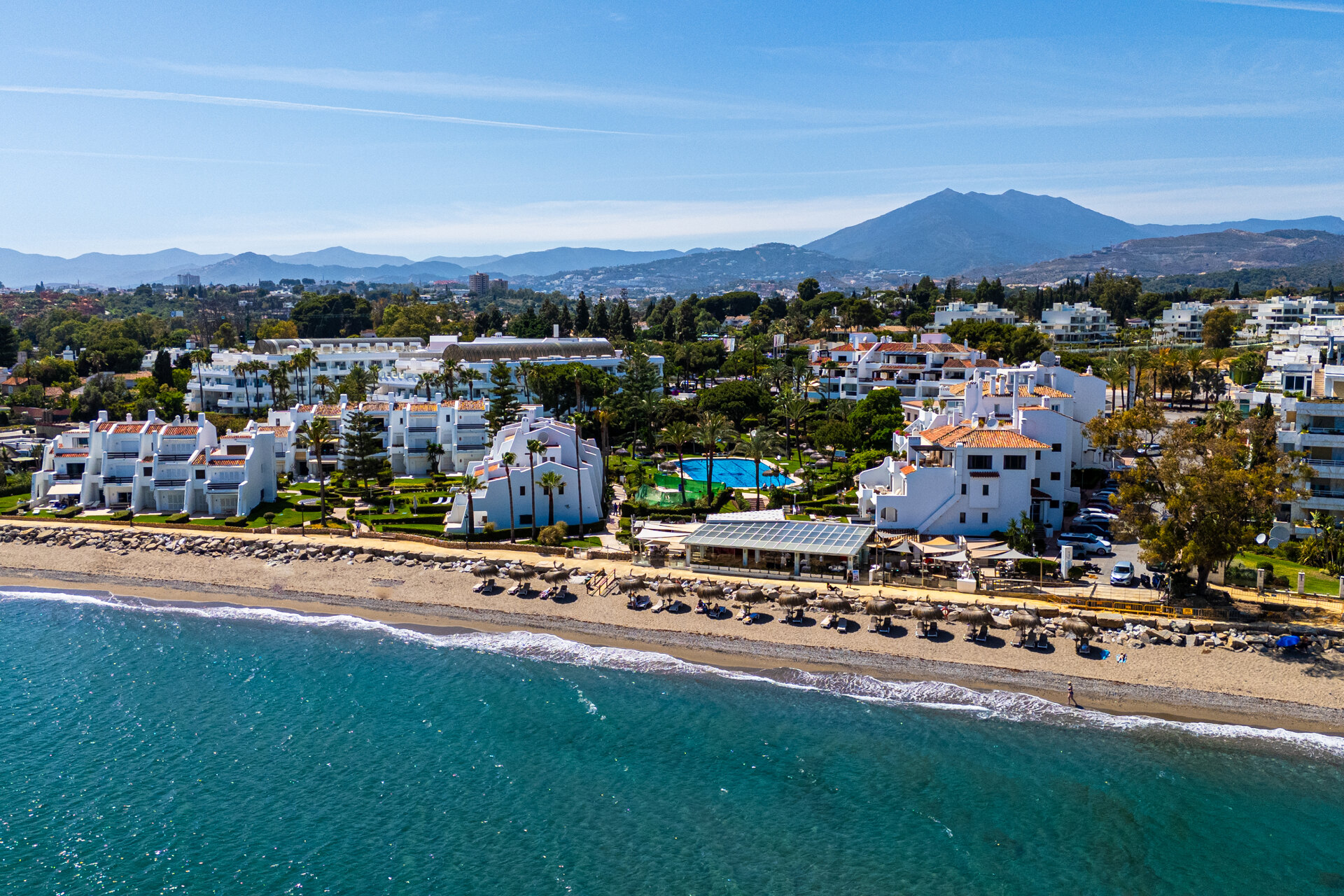 Exceptional beachfront townhouse offers the ultimate coastal lifestyle with uninterrupted sea views