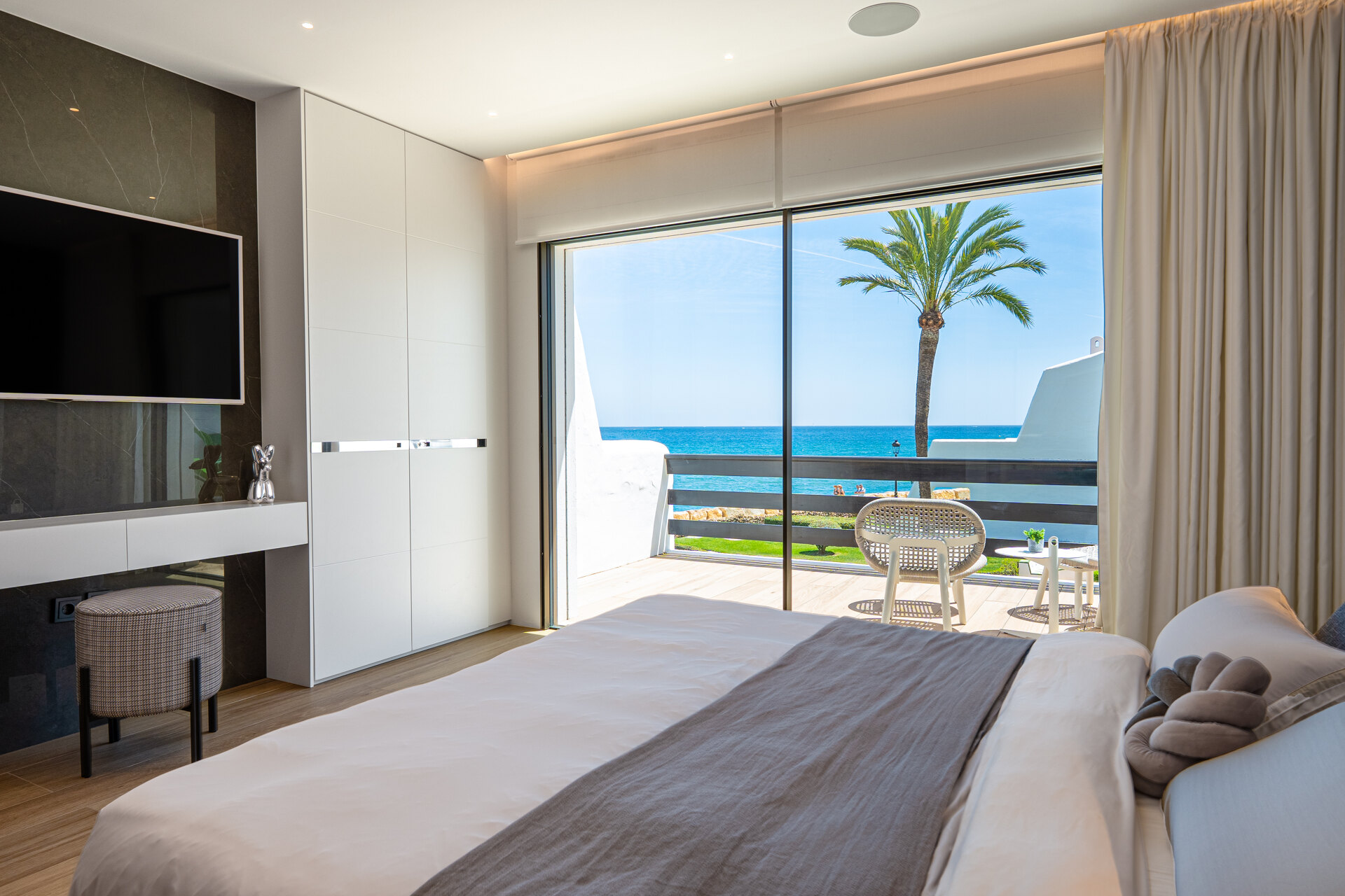Exceptional beachfront townhouse offers the ultimate coastal lifestyle with uninterrupted sea views