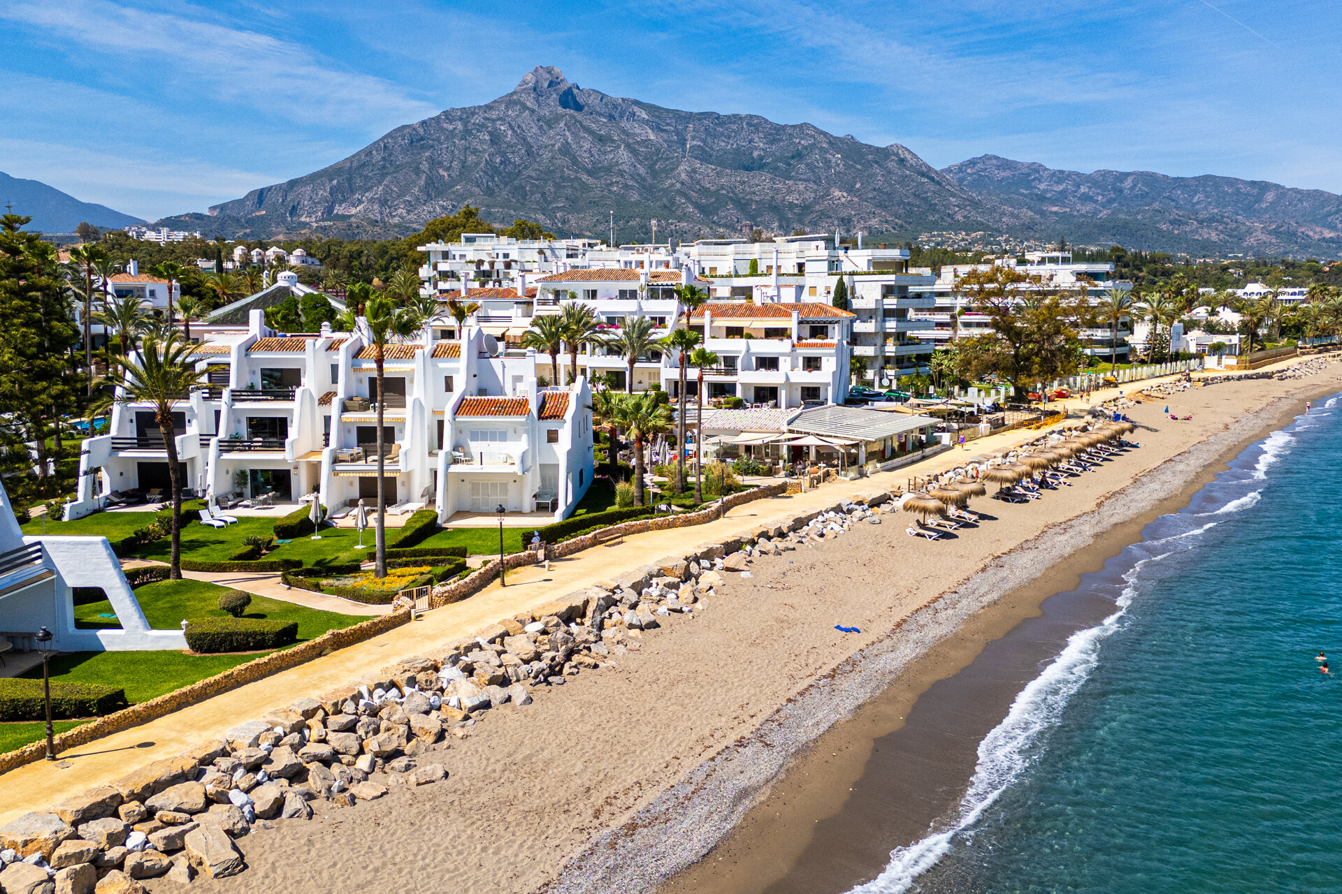 Exceptional beachfront townhouse offers the ultimate coastal lifestyle with uninterrupted sea views