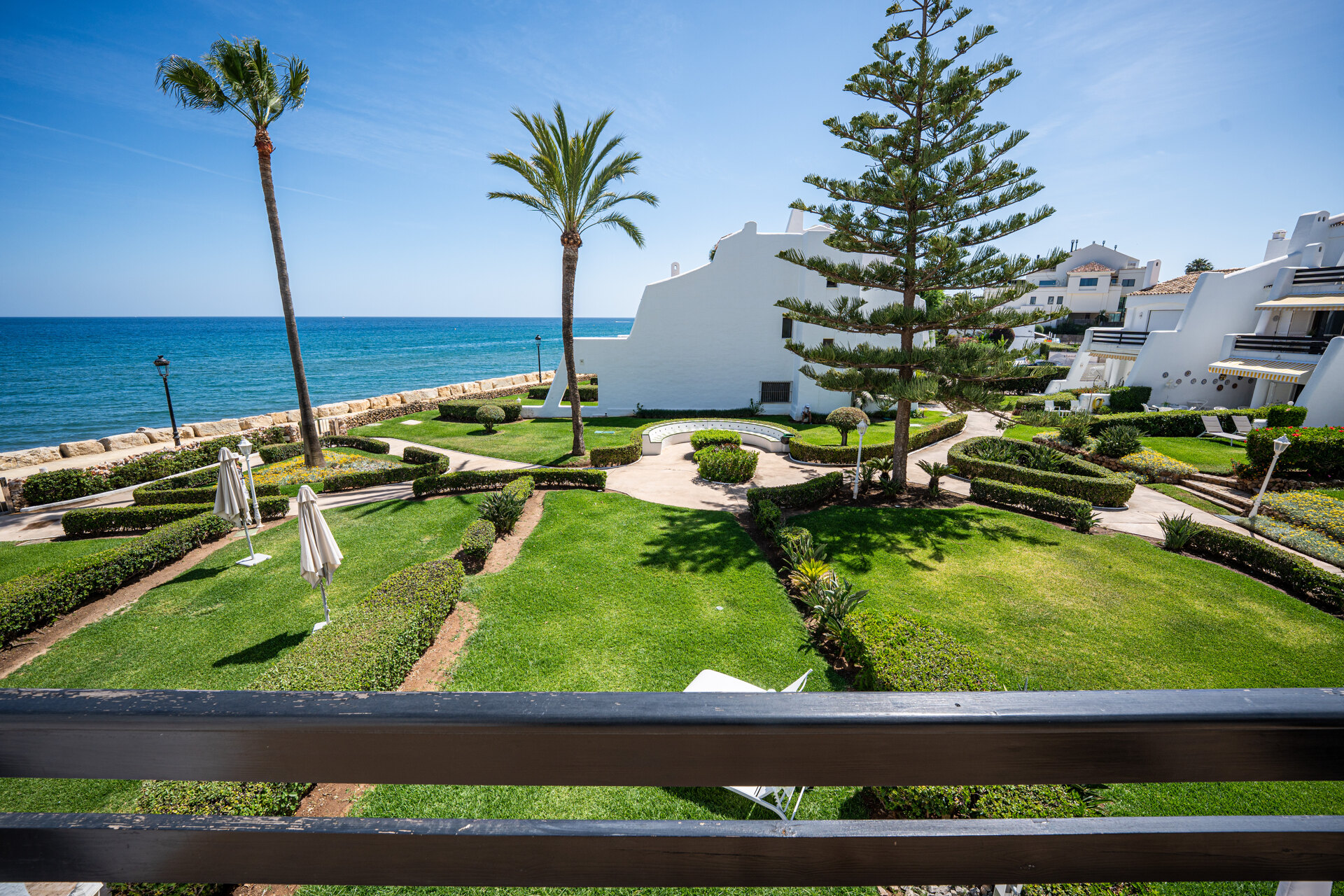 Exceptional beachfront townhouse offers the ultimate coastal lifestyle with uninterrupted sea views