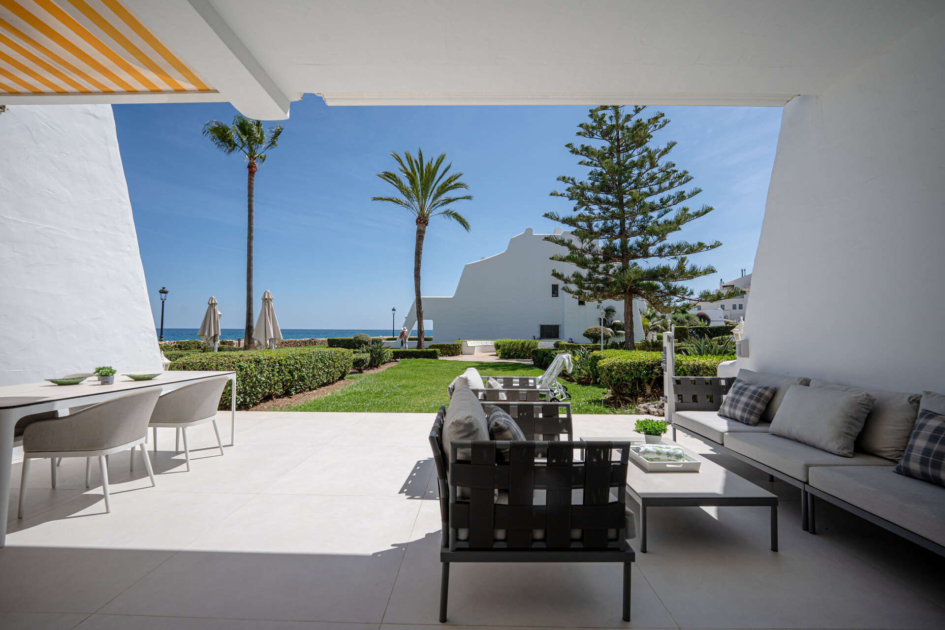 Exceptional beachfront townhouse offers the ultimate coastal lifestyle with uninterrupted sea views
