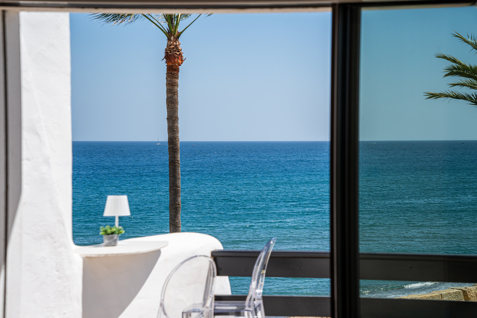 Exceptional beachfront townhouse offers the ultimate coastal lifestyle with uninterrupted sea views