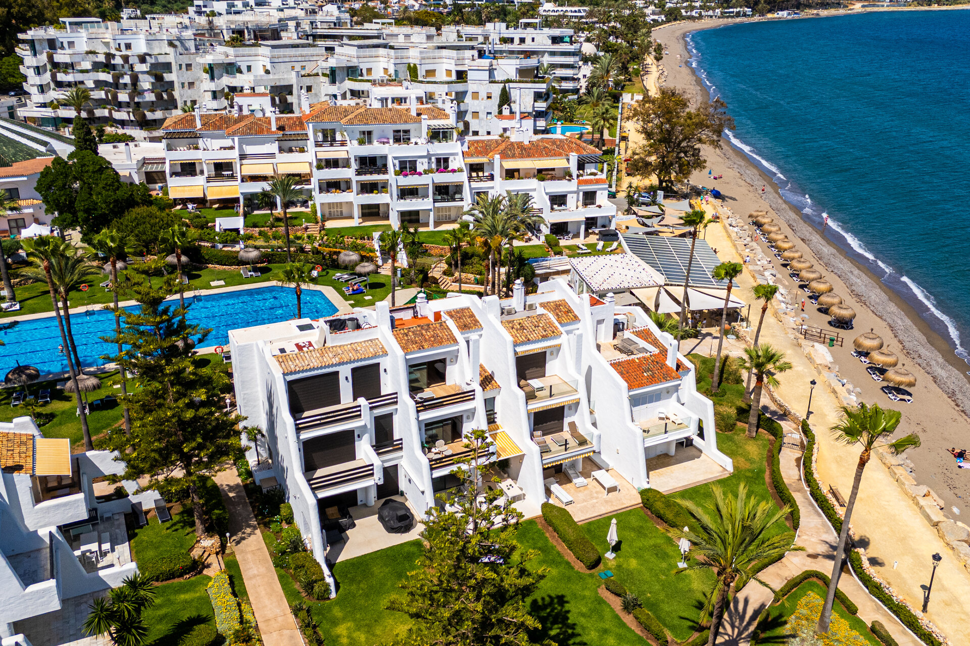 Exceptional beachfront townhouse offers the ultimate coastal lifestyle with uninterrupted sea views