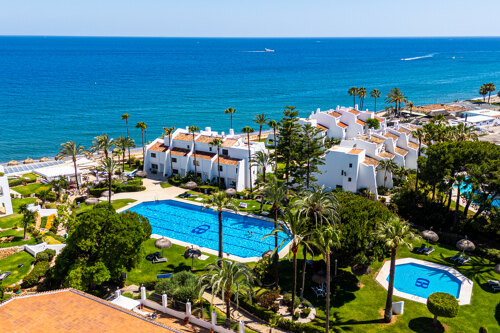 Exceptional beachfront townhouse offers the ultimate coastal lifestyle with uninterrupted sea views